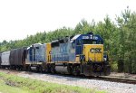 CSX 6904 & 2250 lead a train towards the yard